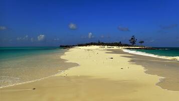 On the beach, white sand, snorkelling, sailing