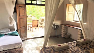 Triple Room, Balcony, City View (Lizanne) | In-room safe, desk, iron/ironing board, free WiFi