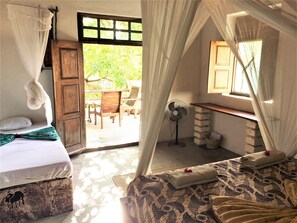 Triple Room, Balcony, City View (Lizanne) | In-room safe, desk, iron/ironing board, free WiFi - Miti Miwiri (Ibo)