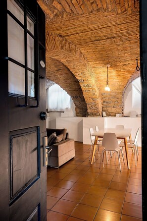 Dungeon Apartment  | Living area | 49-inch flat-screen TV with cable channels, LCD TV