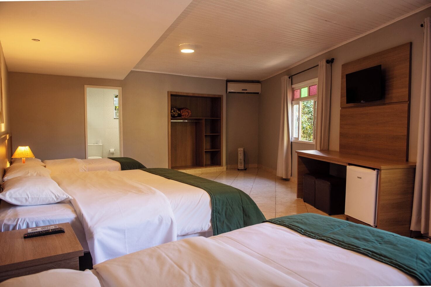 Family Room | Minibar, desk, blackout curtains, free WiFi