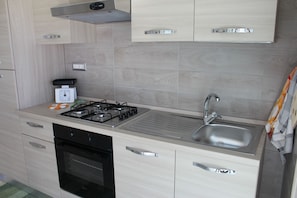Apartment, Pool View, Ground Floor | Private kitchenette