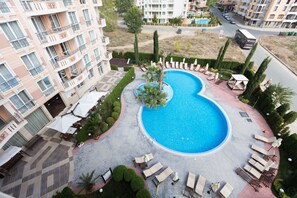 Seasonal outdoor pool, pool loungers