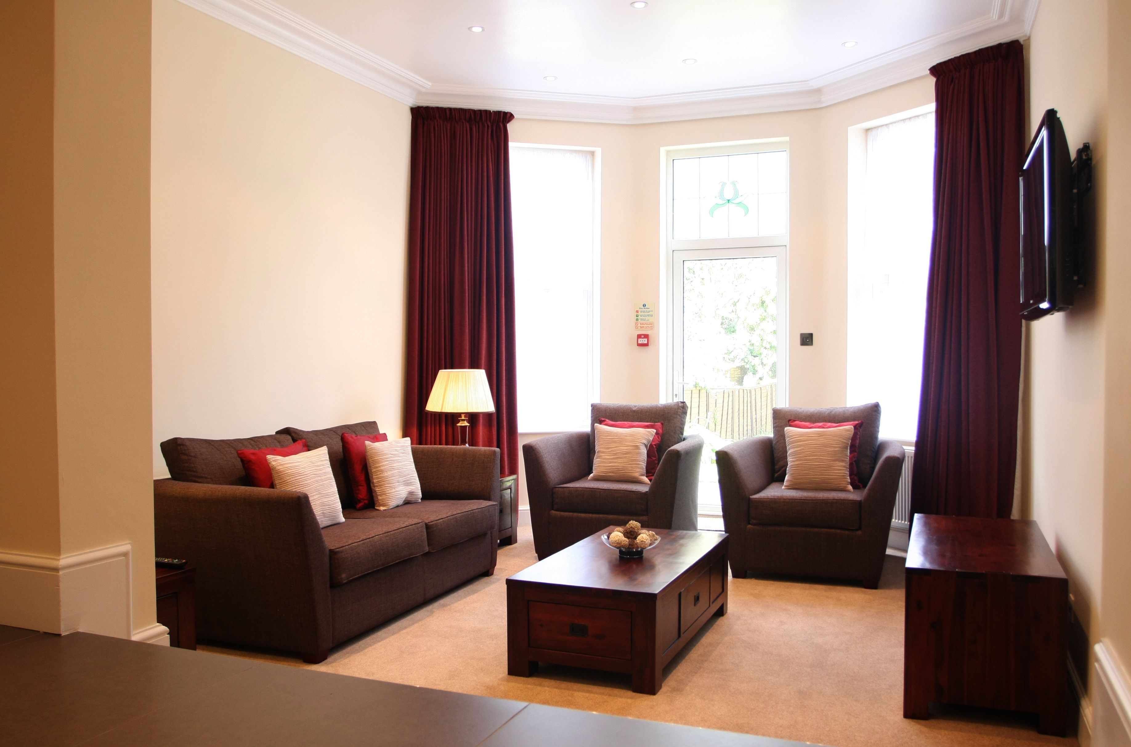 Apartment, 1 Bedroom | Living area | Flat-screen TV