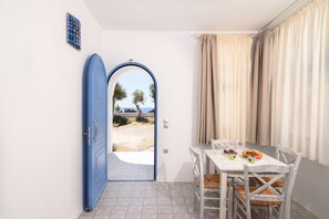 Villa, 2 Bedrooms, Beachfront | Living area | Flat-screen TV - Villa George Santorini (Santorini)