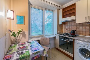 Apartment, 1 Bedroom | Private kitchen | Full-sized fridge, stovetop, electric kettle, cookware/dishes/utensils - FlatHome24 on Tovarishcheskiy 26 (St. Petersburg)