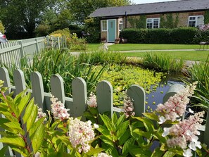 Deluxe studio suite, 1 kingsize bed, bubbelbad, aan tuin | Terrein van de accommodatie