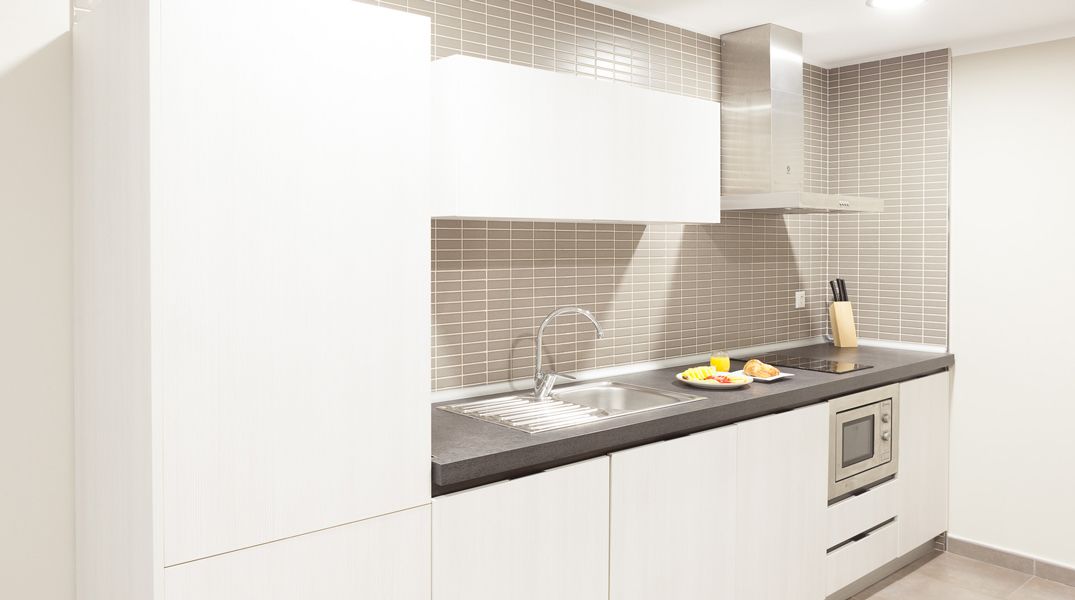 Departamento familiar, 2 habitaciones | Cocina privada | Refrigerador con congelador, microondas y parrilla de estufa 