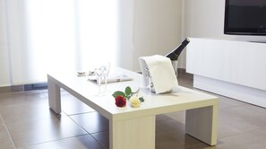 Family Apartment, 2 Bedrooms | Living area | Flat-screen TV - Aparthotel Meseguer (Alcaniz)