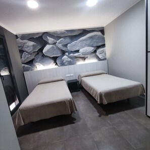 Hypo-allergenic bedding, down duvets, memory-foam beds, desk