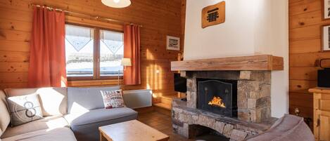 Flat-screen TV, fireplace