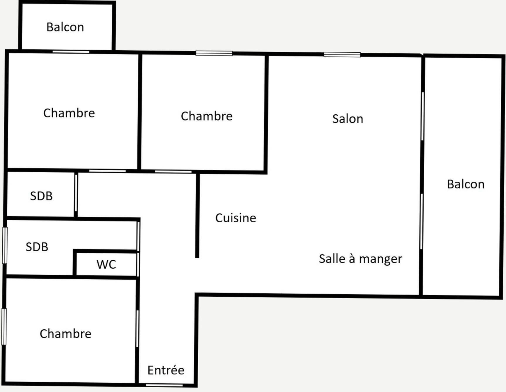 A floor plan with two bedrooms, a bathroom, a kitchen, a dining area, a living room, and a balcony.