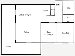 Distribución de un hotel con balcón, comedor, cocina, baño, dormitorio, sala de estar y cuarto de monedas.