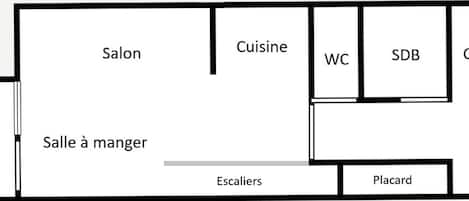 A hotel layout with a balcony, salon, dining room, WC, SDB, coin room, entrance, and staircase.
