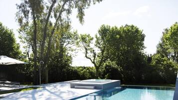 Outdoor pool, open 7:00 AM to 9:00 PM, sun loungers