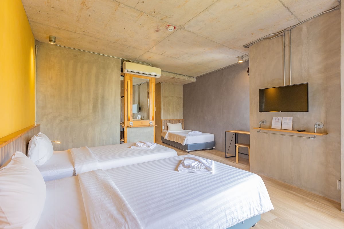 deluxe triple room | in-room safe, blackout curtains, free wifi, bed sheets