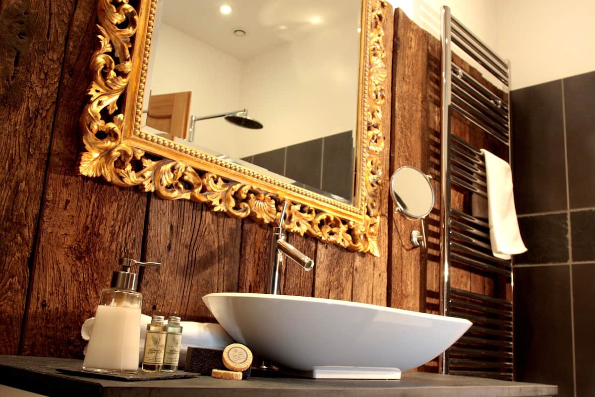 premium suite, terrace, garden area | bathroom | hair dryer, slippers, towels