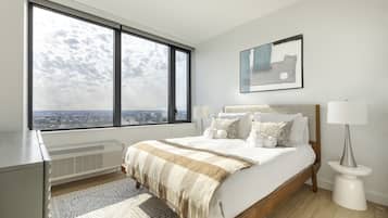 Apartemen Eksekutif, 2 kamar tidur, pemandangan kota | 2 kamar tidur, tirai kedap cahaya, kedap suara, dan setrika/meja setrika