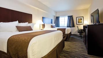 Premium bedding, pillowtop beds, desk, laptop workspace