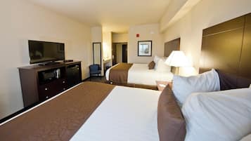 Premium bedding, pillow-top beds, desk, laptop workspace