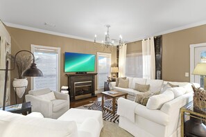 Flat-screen TV, fireplace, DVD player