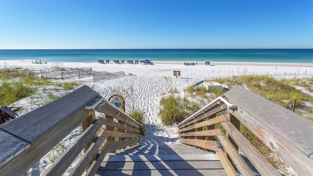 A wooden staircase leading to a beach with umbrellas and lounge chairs. - Whitesand - Gulf View, Heated Private Pool, Short Walk to the Beach! (Miramar Beach)
