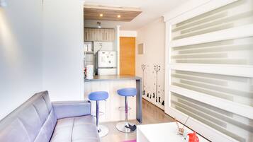 Standard Apartment, 2 Bedrooms | Living area | Flat-screen TV