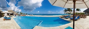 2 outdoor pools, open 9:00 AM to 6:00 PM, pool umbrellas, pool loungers