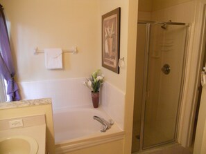 Combined shower/bathtub, towels, soap