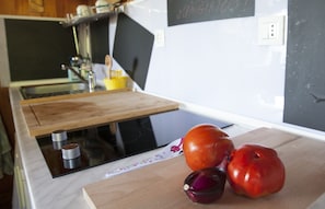 Fridge, stovetop, coffee/tea maker, electric kettle