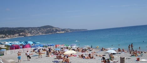 On the beach, beach towels