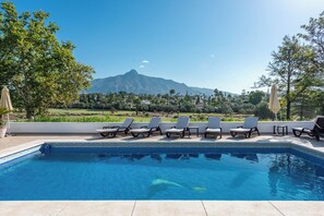 Outdoor pool, a heated pool - Villa Casa La Concha- Luxury 6 bed Villa in Marbella, Heated Pool, Mountain View (Nueva Andalucia)