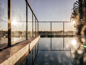 Outdoor pool, open 6:30 AM to 10:00 PM, sun loungers