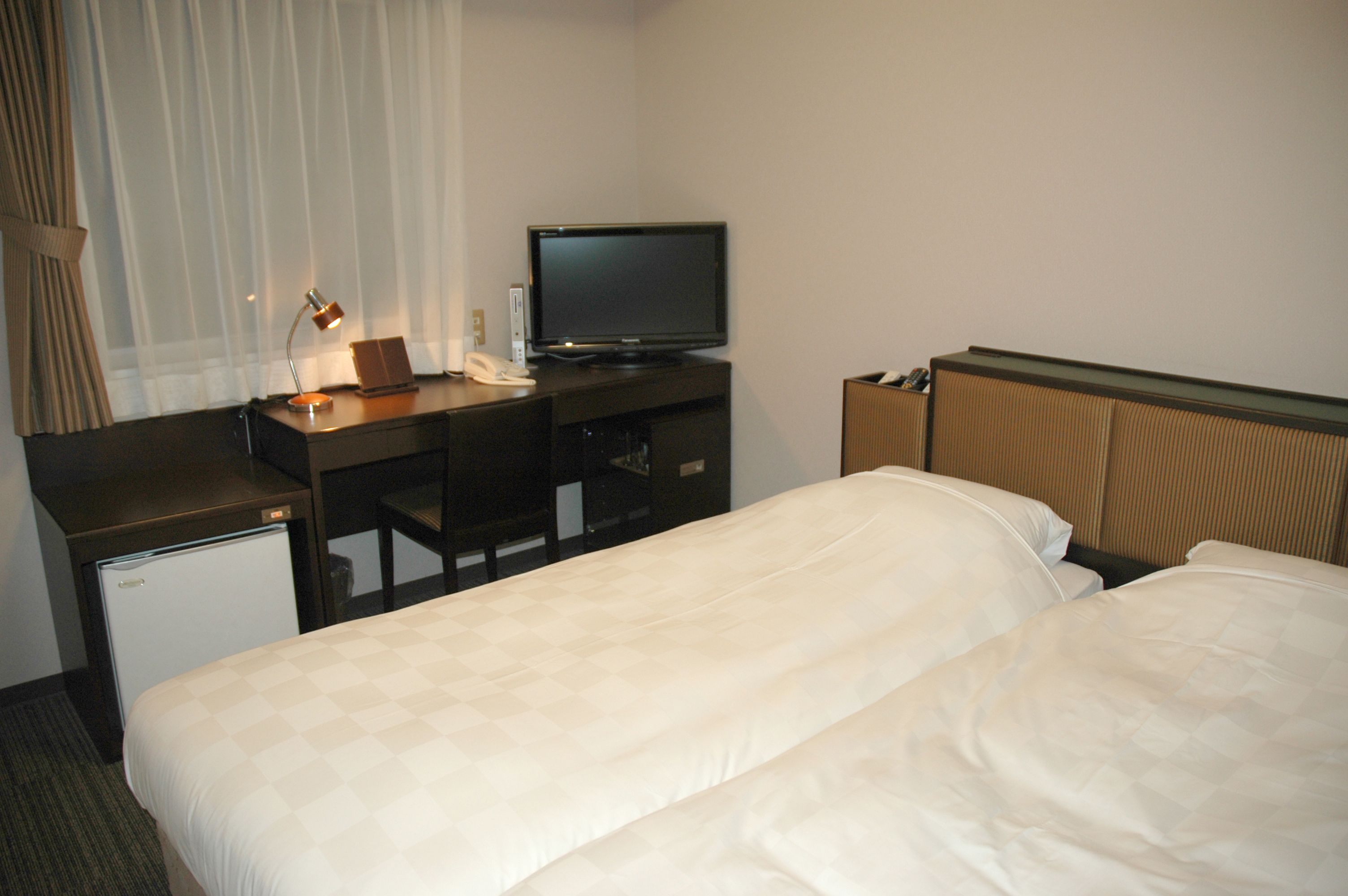 economy twin room, non smoking | down duvets, desk, blackout curtains, free wifi