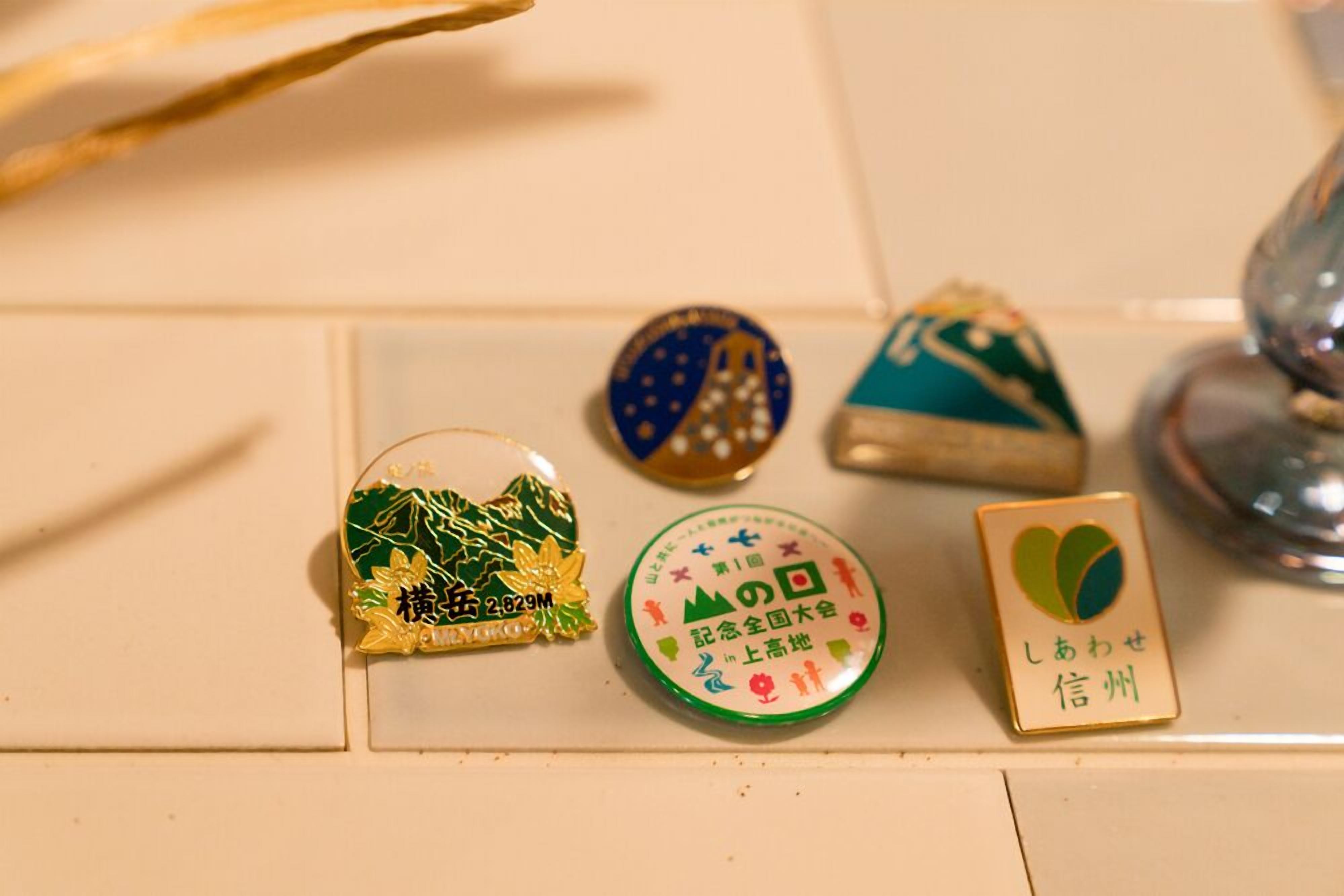 Four decorative items on a surface.