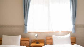 Twin Room, Non Smoking, Shared Bathroom (No meal) | Down comforters, desk, free WiFi, bed sheets