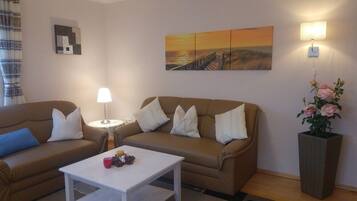 Flat-screen TV, toys, books, stereo