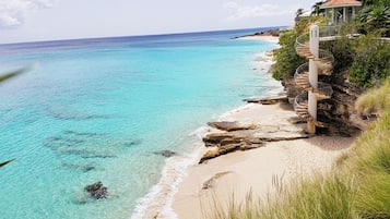 On the beach, sun loungers, beach towels
