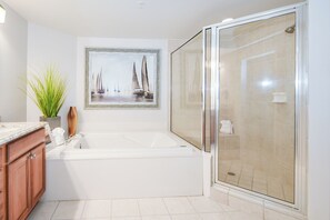 Shower, jetted tub, hair dryer, towels