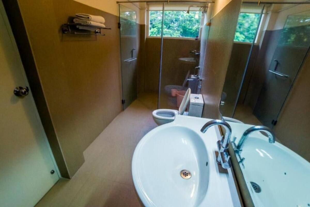 Shower, rainfall showerhead, towels