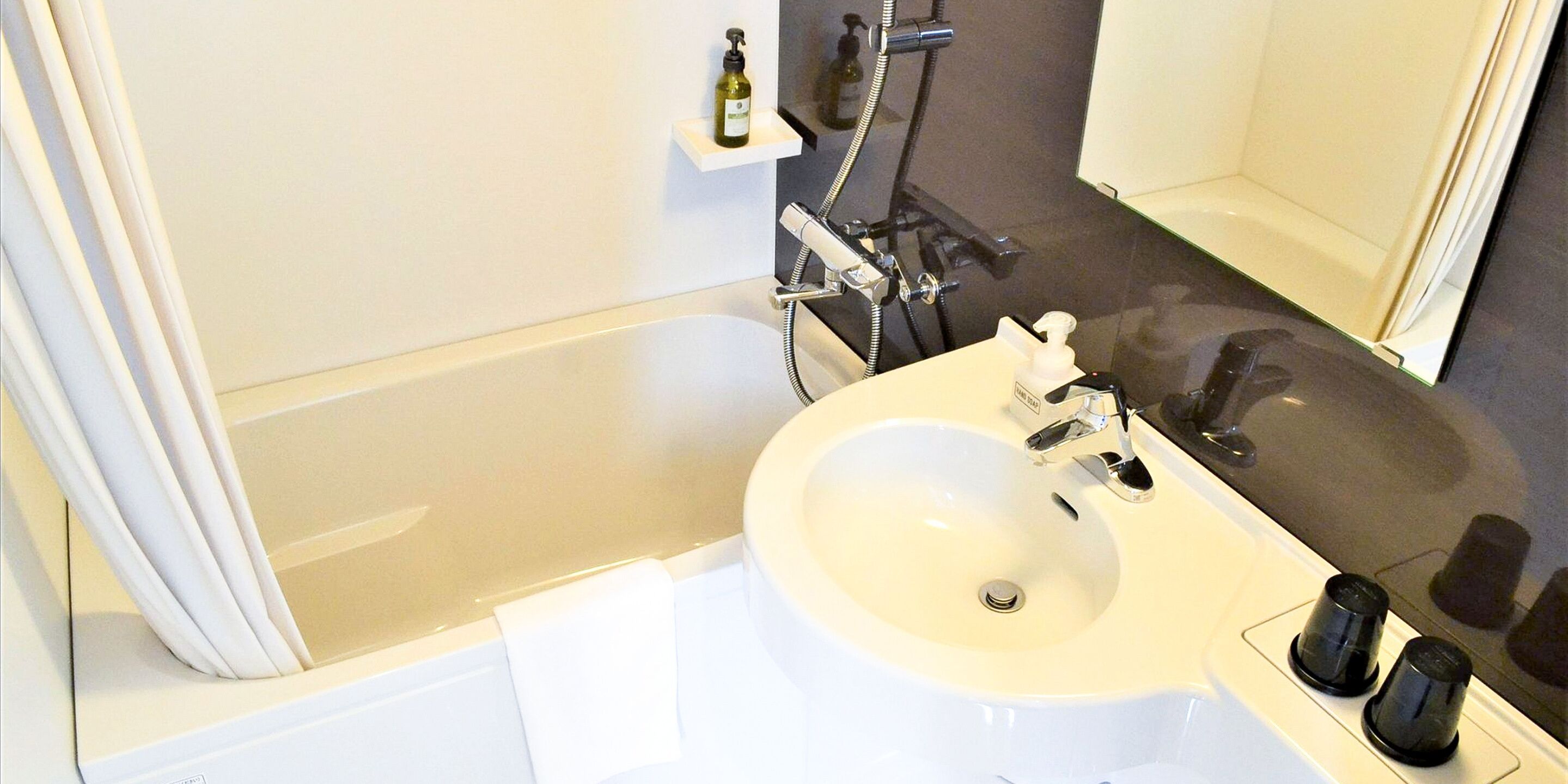 separate bathtub and shower, deep-soaking bathtub, free toiletries