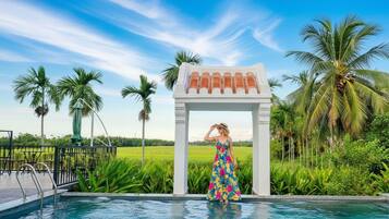 Outdoor pool, pool umbrellas, pool loungers