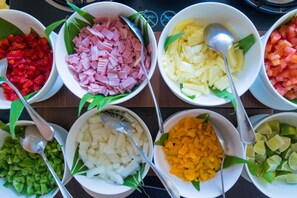 Bowls of chopped vegetables and meat on a table. - Imperial Nha Trang Hotel (Nha Trang)
