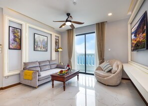 Imperial Suite, Balcony, Sea View | Living room | 32-inch Smart TV with cable channels, TV - Imperial Nha Trang Hotel (Nha Trang)