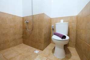 Studio | Bathroom | Shower, free toiletries, towels - Studio at Green Pramuka City Serene Apartment Living By Travelio (Jakarta)