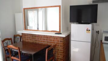 Two-Bedroom Apartment (Sleeps 4), Kitchen | In-room dining