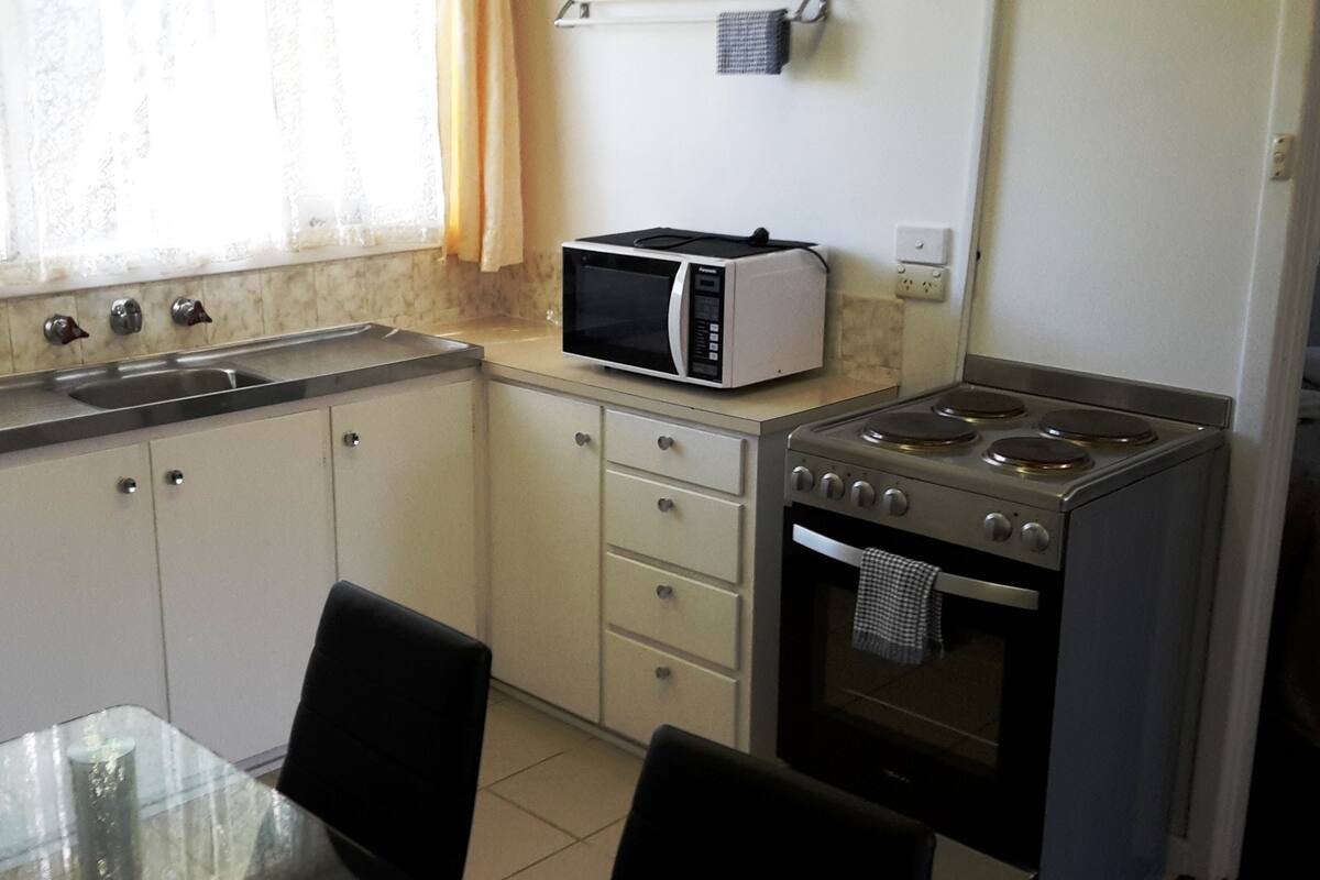 Appartement Économique, cuisine | Cuisine privée | Micro-ondes, cafetière/bouilloire, bouilloire électrique