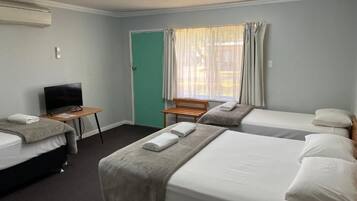 Family Room | Iron/ironing board, bed sheets