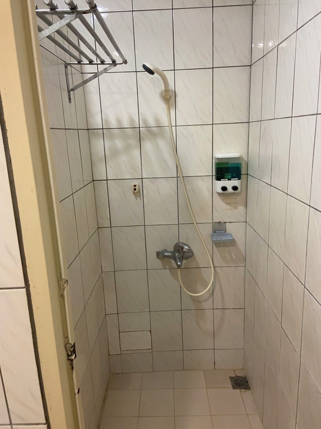 basic quadruple room | bathroom | shower, free toiletries, hair dryer, slippers