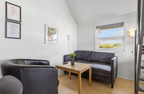Standard-Ferienhütte | Wohnzimmer | Flachbildfernseher